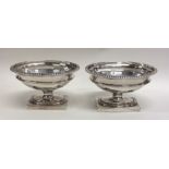 A good pair of Victorian silver salts on square ba
