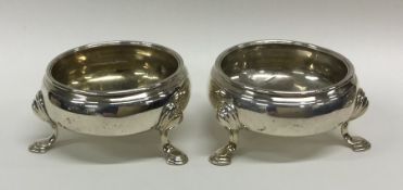 A pair of George III silver salts on cabriole legs