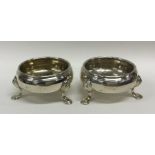 A pair of George III silver salts on cabriole legs