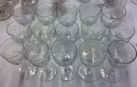 A group of fifteen Edwardian etched sherry glasses