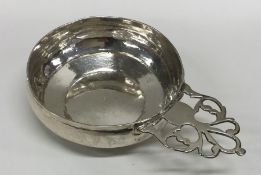 An early 18th Century silver bleeding bowl with pi