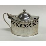 A George III silver pierced mustard with hinged to