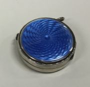 A silver and enamelled pill box. Birmingham 1926.