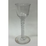 A tall Georgian air twist cordial glass with spira
