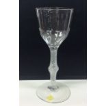 A large Georgian air twist wine glass with knobbed