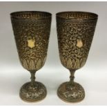 A pair of fine quality Indian silver gilt cups dec
