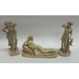 A set of three attractive porcelain figures of sem