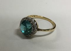 A large circular zircon and diamond cluster ring i