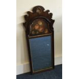 A mahogany mirror decorated with flowers. Est. £30