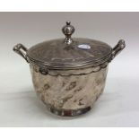 An Edwardian silver two handles sugar bowl and cov