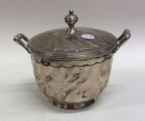 An Edwardian silver two handles sugar bowl and cov