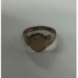 A 9 carat signet ring. Approx. 4.6 grams. Est. £50