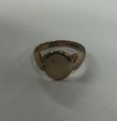 A 9 carat signet ring. Approx. 4.6 grams. Est. £50