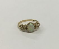 An Antique opal and diamond seven stone ring in cl