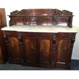 A fine quality rosewood break front chiffonier wit