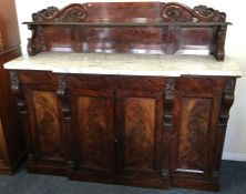 A fine quality rosewood break front chiffonier wit