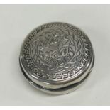 An attractive Edwardian silver engraved pill box.