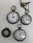 A group of four silver and other fob watches. Est.