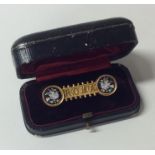 A cased micro-mosaic 'Roma' brooch in gold frame.