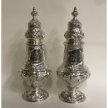 A fine pair of Georgian silver sugar casters heavi