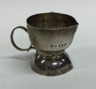 An unusual Georgian silver double lipped measuring