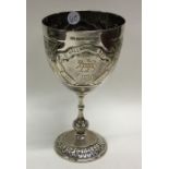A good quality Edwardian silver goblet decorated w