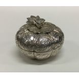 An Eastern silver pill box in the form of a fruit