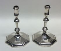 A good pair of heavy cast silver taper candlestick