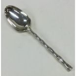 An Edwardian silver dessert spoon of Chinese desig