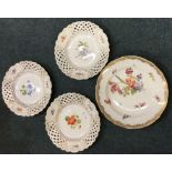 An attractive Meissen plate together with three ot