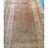 A large old Oriental runner. Est. £50 - £80.