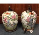 A pair of Chinese baluster shaped vases decorated