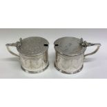 A rare pair of Victorian silver mustards finely en