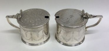 A rare pair of Victorian silver mustards finely en