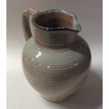 DORIS GREGG (British: 1926 - 2017): A pottery jug