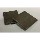Two engine turned silver cigarette cases. Approx.