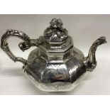 A Victorian silver octagonal engraved teapot with