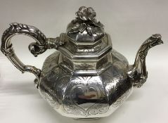 A Victorian silver octagonal engraved teapot with