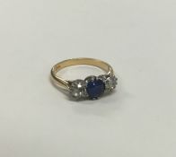 A sapphire and diamond five stone ring in 18 carat