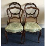 A set of four mahogany hoop back chairs. Est. £30