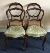 A set of four mahogany hoop back chairs. Est. £30