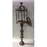 A tall brass marine lamp with shaped base. Approx.