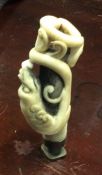 A 19th Century carved ivory seal. Est. £70 - £80.