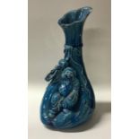 A Chinese pottery spill vase in blue ground. Appro