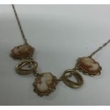 A 9 carat coral cameo necklet with ring clasp and