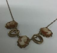 A 9 carat coral cameo necklet with ring clasp and