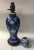 A Chinese blue and white urn shaped vase decorated