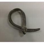 An Antique silver scarf clip in the form of a snak