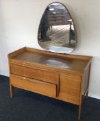 A stylish Danish dressing chest of typical form. E