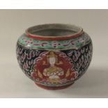 A small Chinese squat pot decorated with figures i